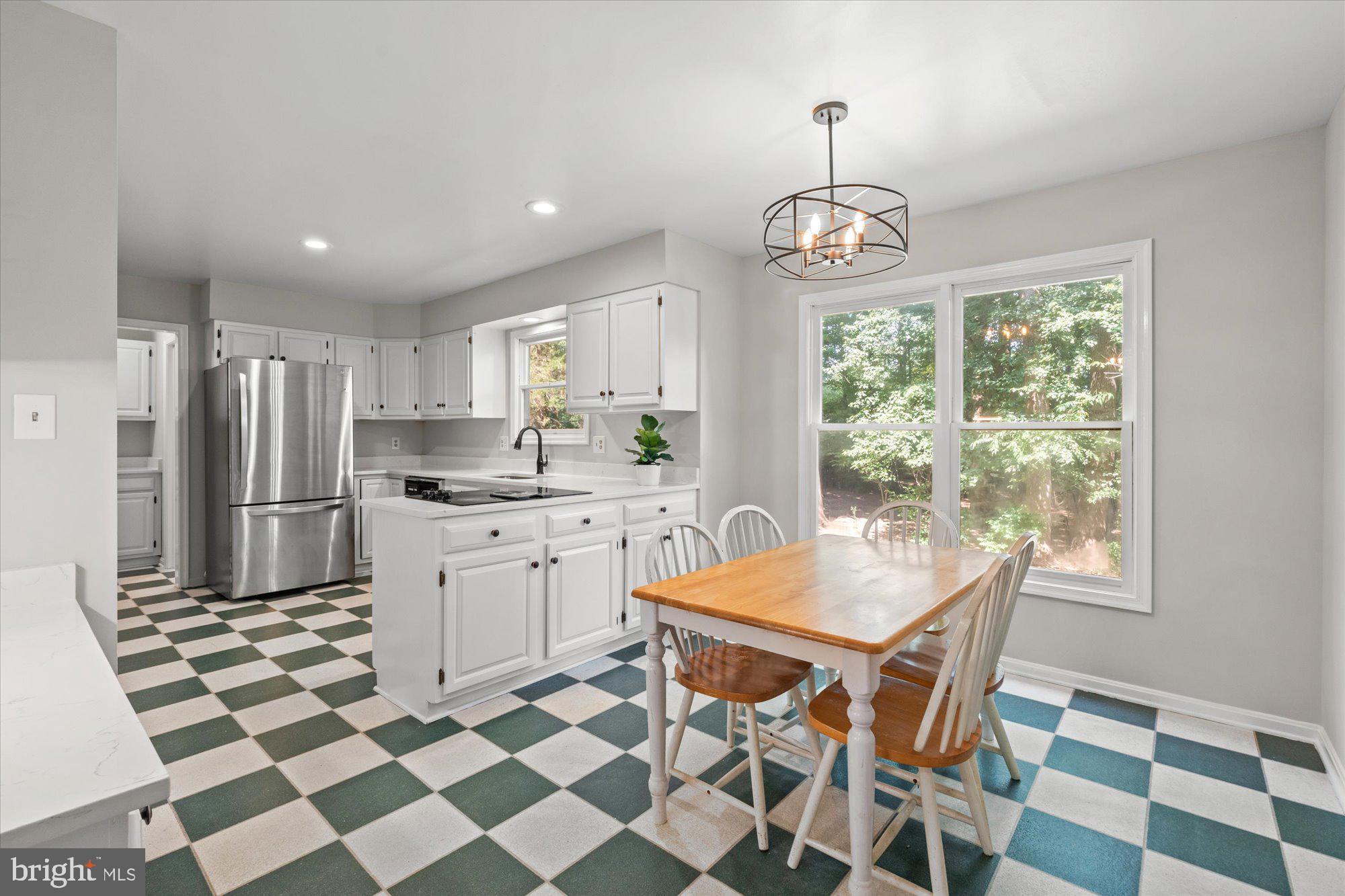 10100 Lawyers Road Vienna, VA 22181 - Photo 16 of 41 Eat-in Kitchen w/ views of Backyard