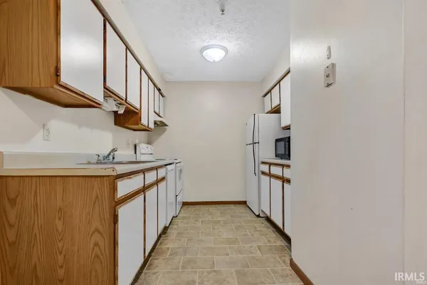 $210,000 | 3230 John Hinkle Place, Bloomington, IN 47408