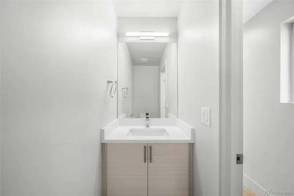 a view of a hallway with washer and dryer