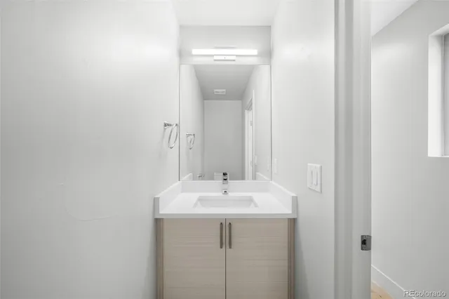 a view of a hallway with washer and dryer