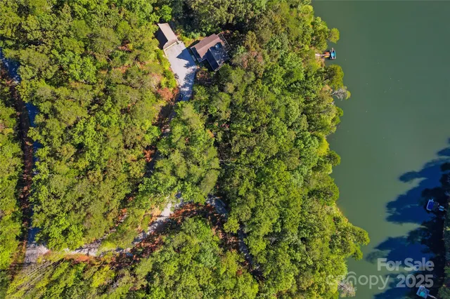 a view of a lake with a garden
