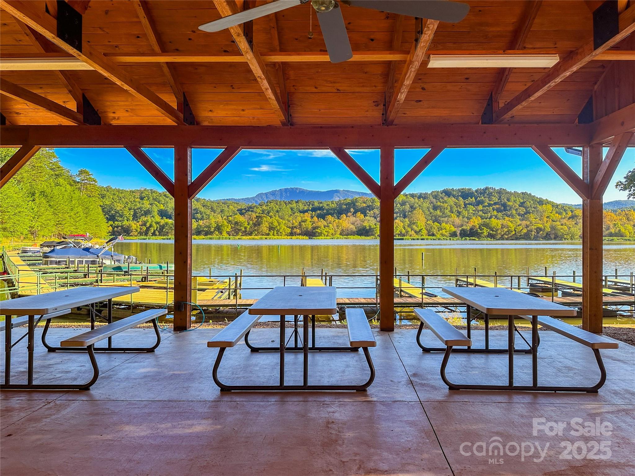 Lot 15 South Cove Rd Mill Spring, Unit 15 Mill Spring, NC 28756 - Photo 44 of 47 a building outdoor space with patio furniture and swimming pool