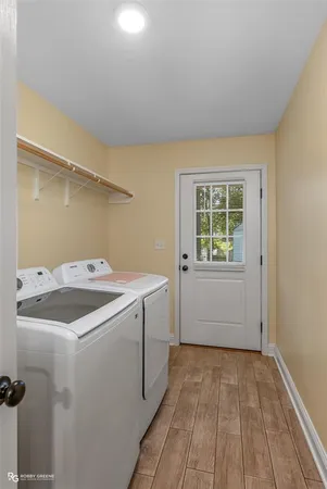 a utility room with dryer and washer