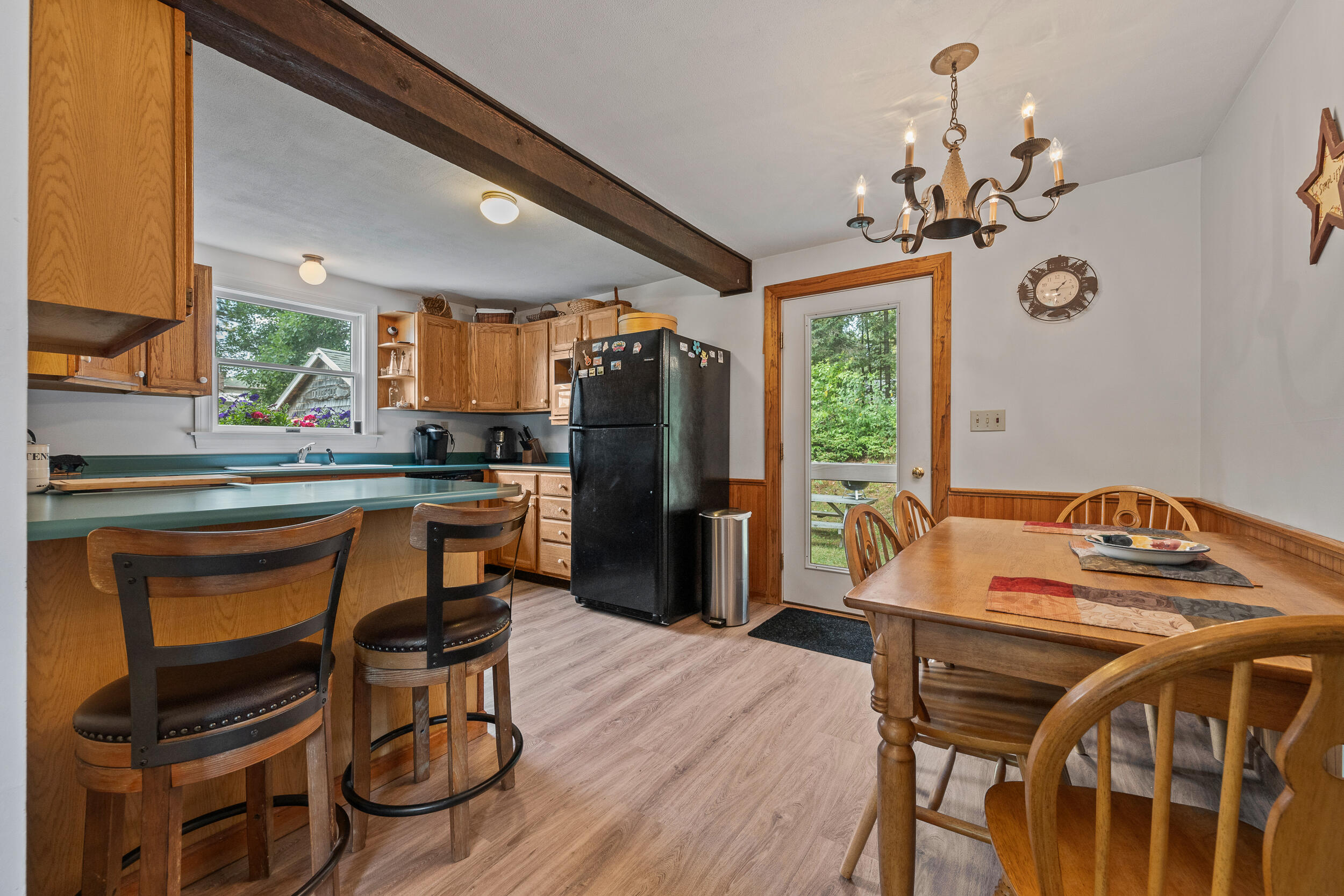 31 Franklin Street Oquossoc, ME 04964 - Photo 18 of 42 Door to Back Deck