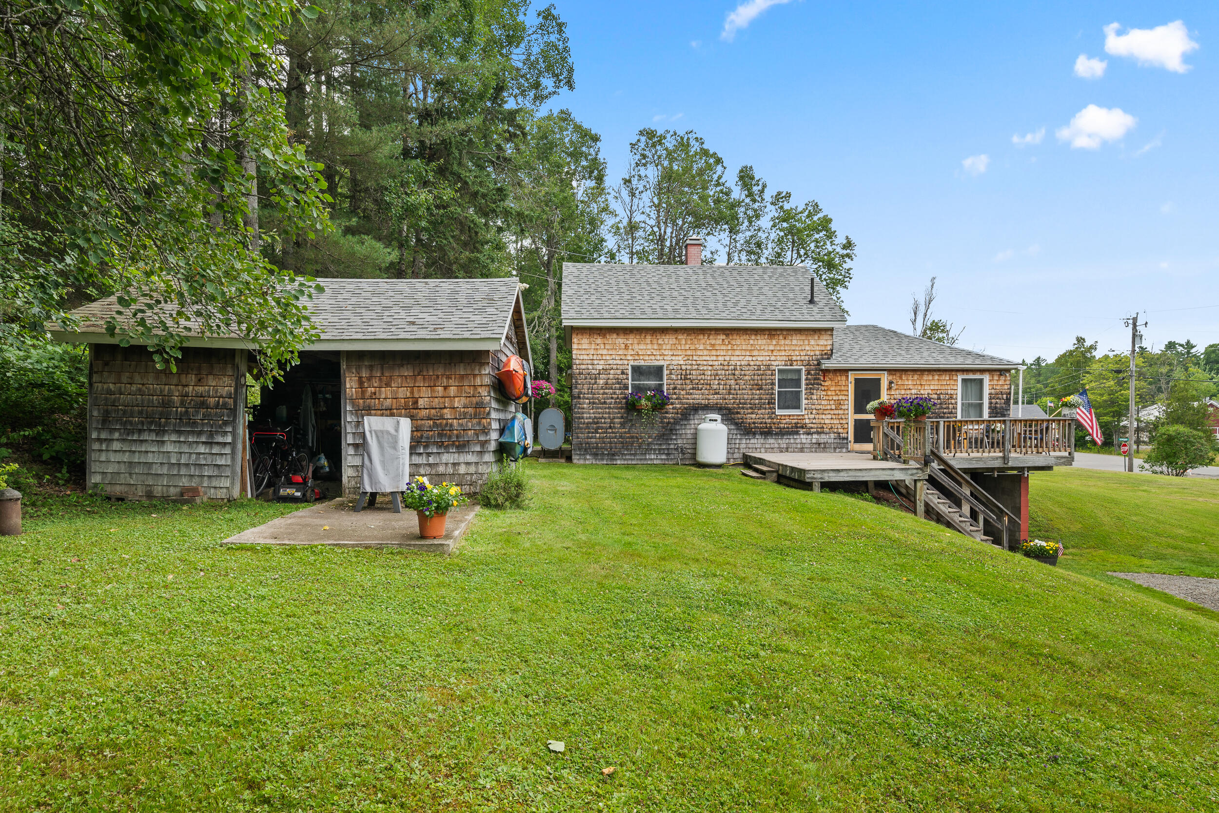 31 Franklin Street Oquossoc, ME 04964 - Photo 8 of 42 Side View