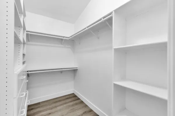 a view of an empty walk in closet