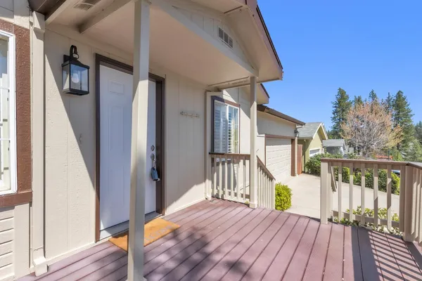 a view of deck with furniture and wooden floor