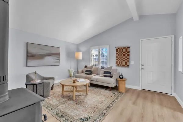 a living room with furniture and a couch