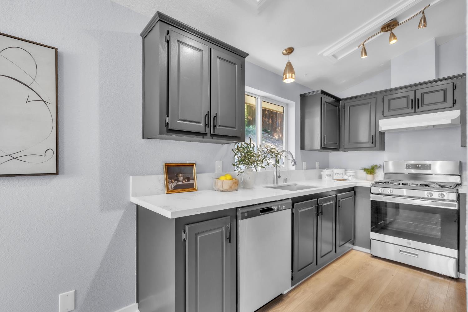 103 Winder Road Colfax, CA 95713 - Photo 4 of 25 Updated kitchen with new quartz counters and appliances.