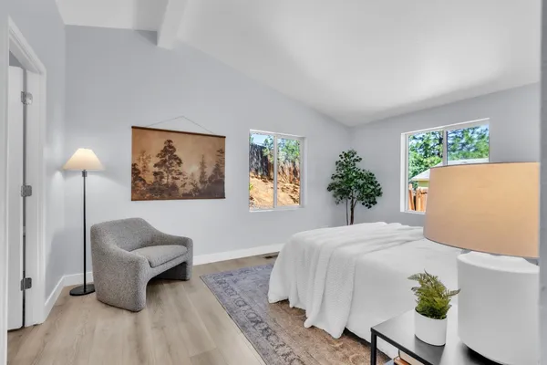 a living room with furniture and a couch