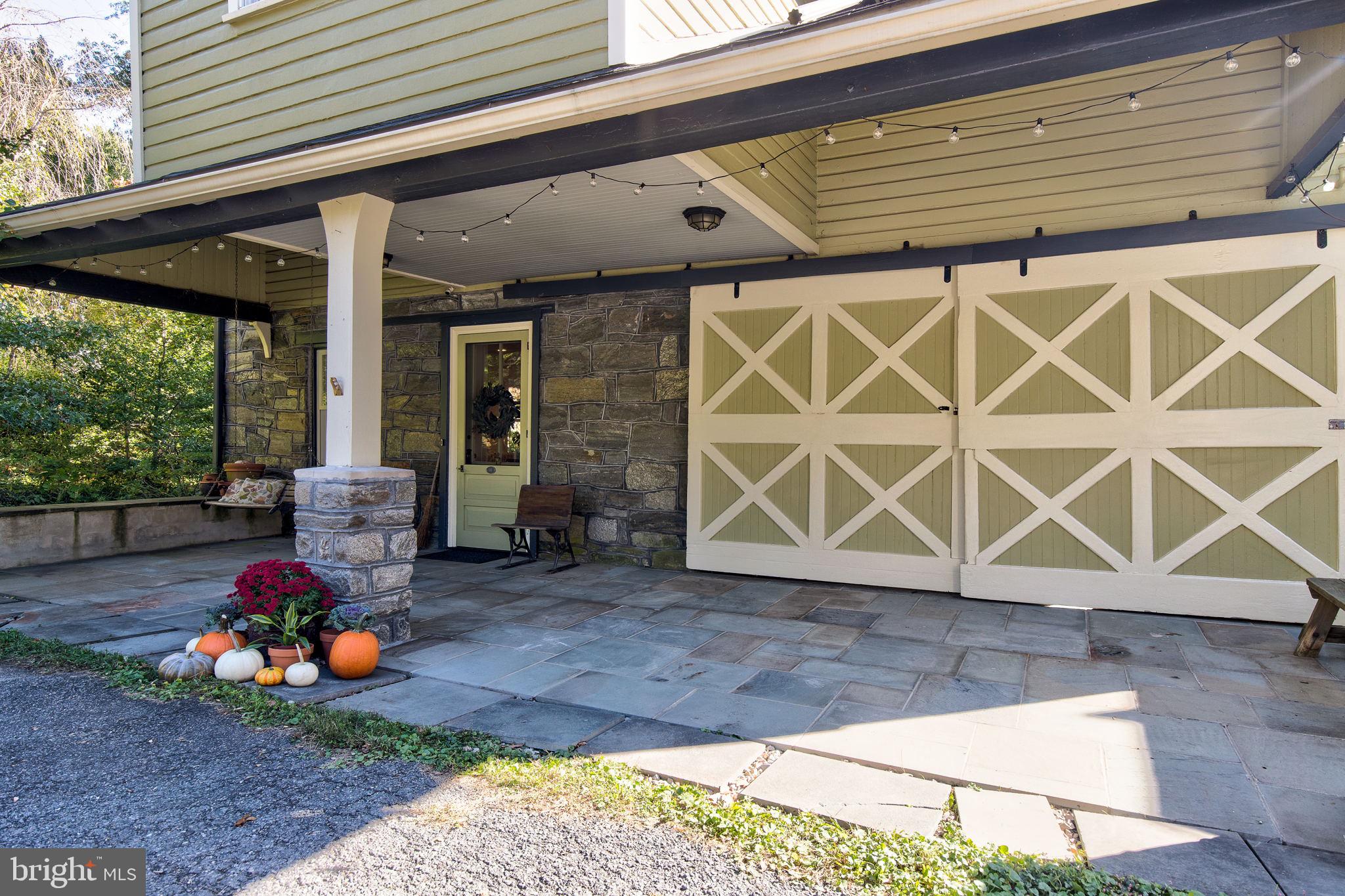 317 Maple Avenue Swarthmore, PA 19081 - Photo 36 of 41 Front porch with garage
