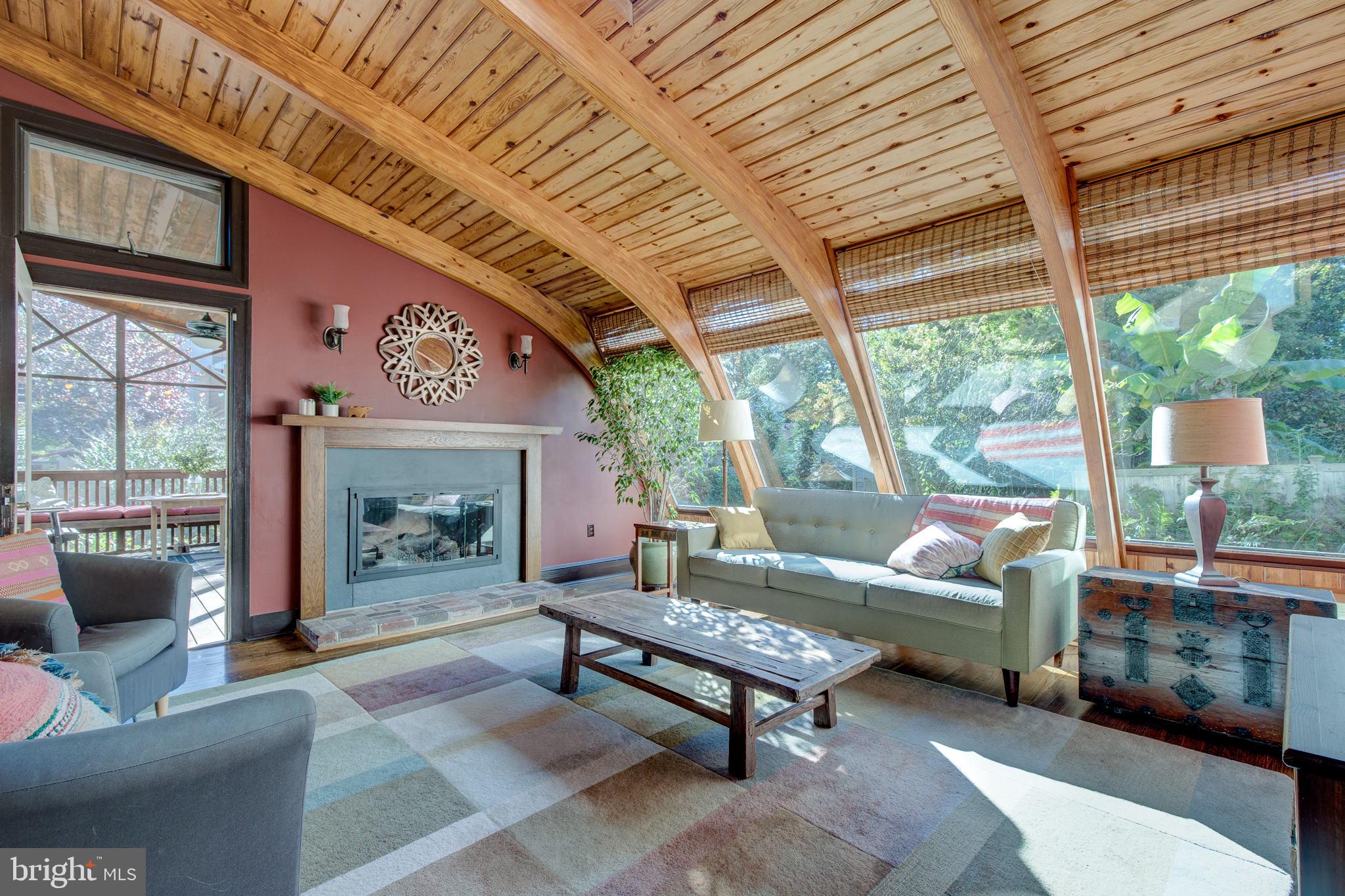 317 Maple Avenue Swarthmore, PA 19081 - Photo 7 of 41 Family Room w/ fireplace and door to screen porch