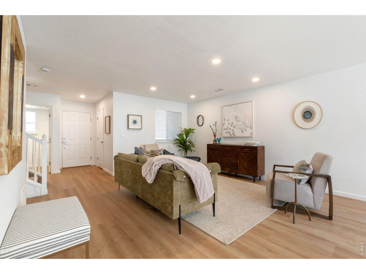 5761 Ceylon Street Denver, CO 80249 - Photo 3 of 29 Newly renovated interior is light and airy with gorgeous new LVP floors and fresh paint.