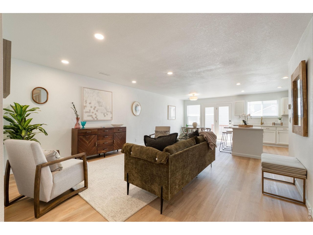 5761 Ceylon Street Denver, CO 80249 - Photo 4 of 29 Bright, open living space designed for comfort.