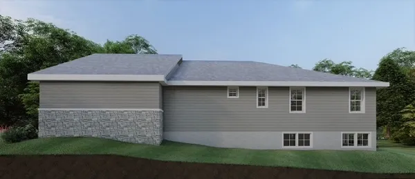 a aerial view of a house with a yard