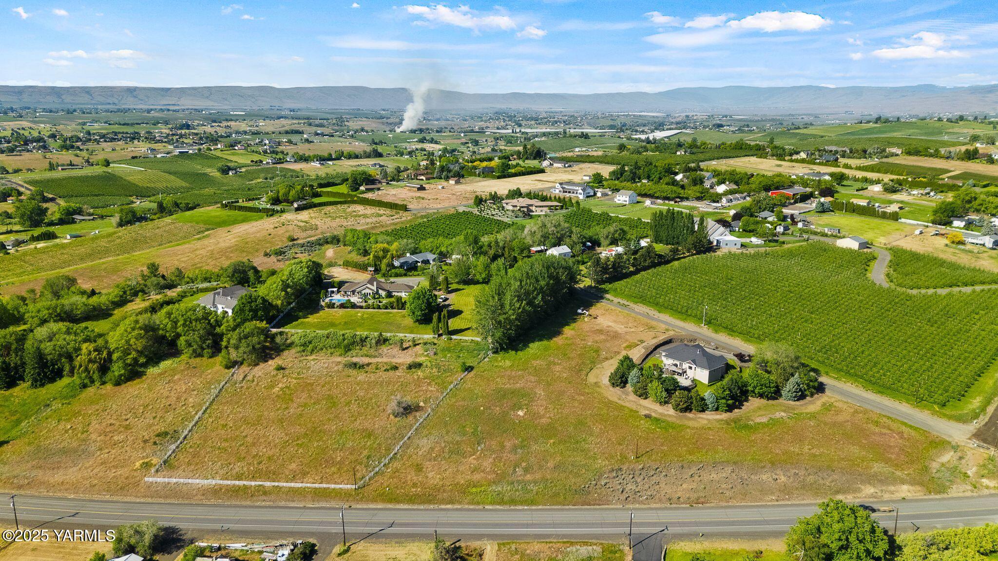 11471 Marble Lane Yakima, WA 98908 - Photo 2 of 5 an aerial view of a residential houses with outdoor space
