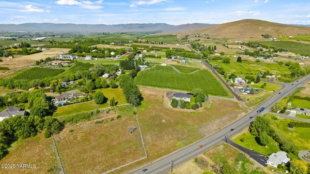 a view of a city with mountains in the background