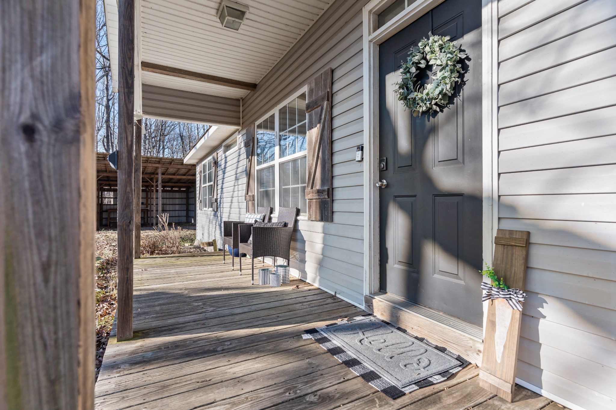 590 Jackson Hollow Road Goodspring, TN 38460 - Photo 12 of 37 a view of a house with a door and wooden floor