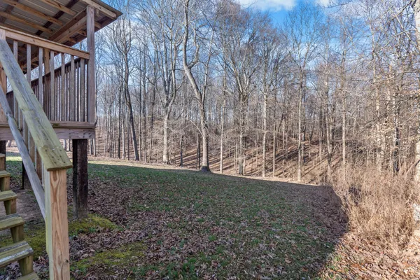 a view of wooden floor in front of a house
