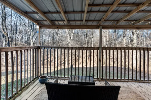 a view of deck with a chair
