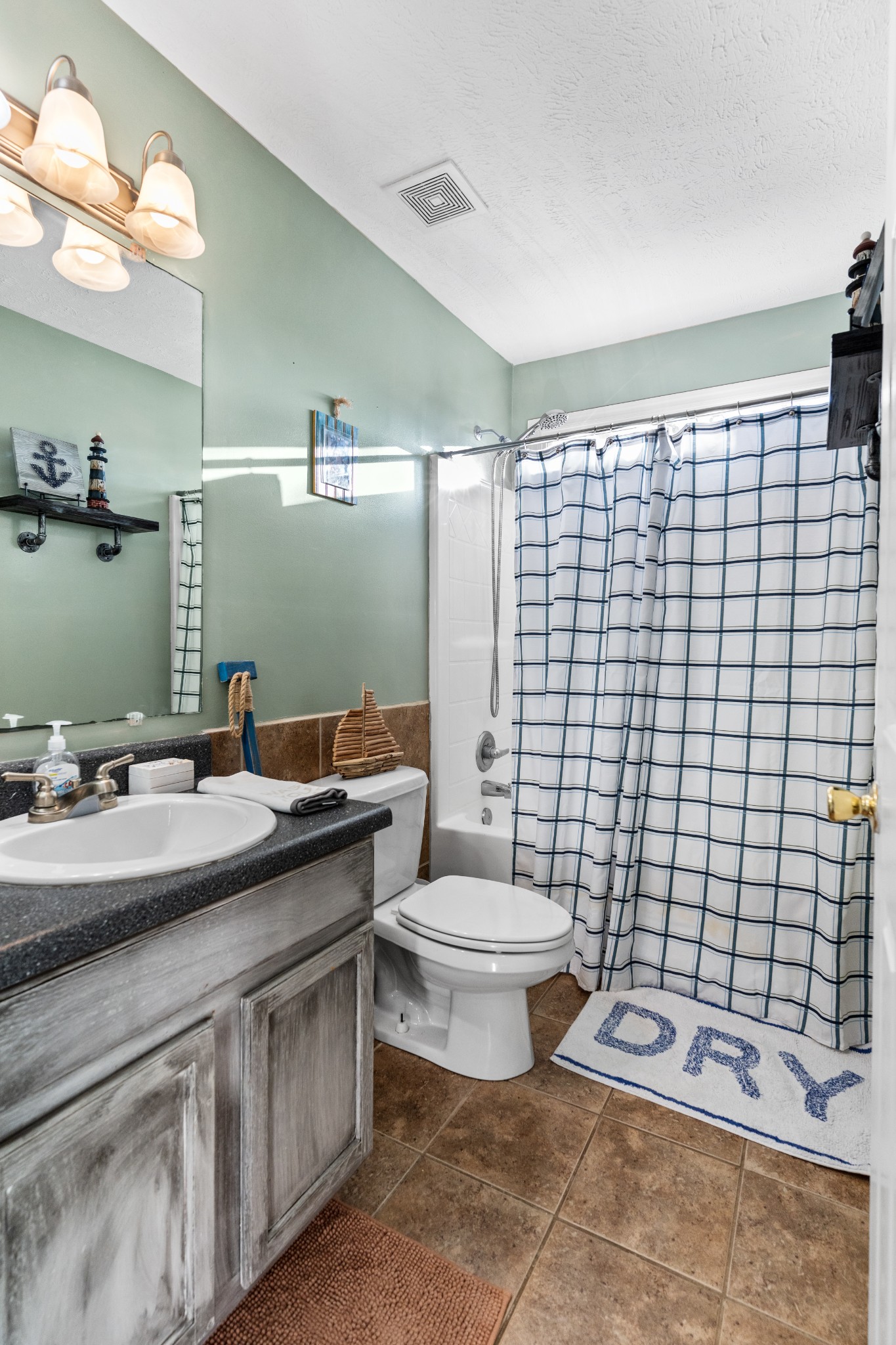 590 Jackson Hollow Road Goodspring, TN 38460 - Photo 30 of 37 a bathroom with a double vanity sink toilet and mirror
