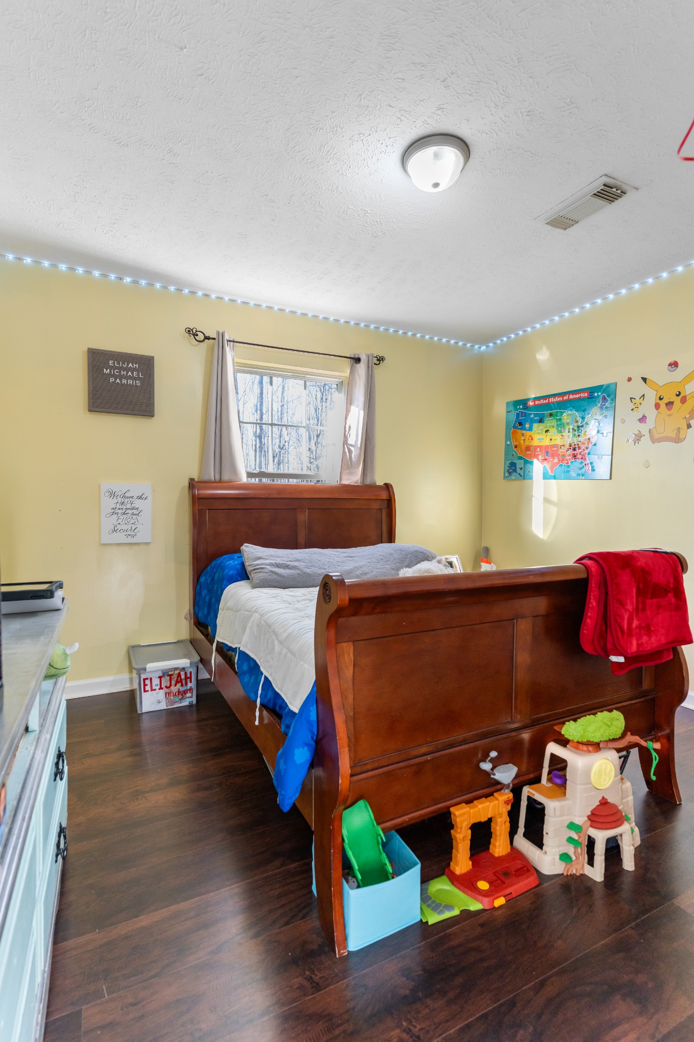 590 Jackson Hollow Road Goodspring, TN 38460 - Photo 32 of 37 a bedroom with a bed and wooden floor
