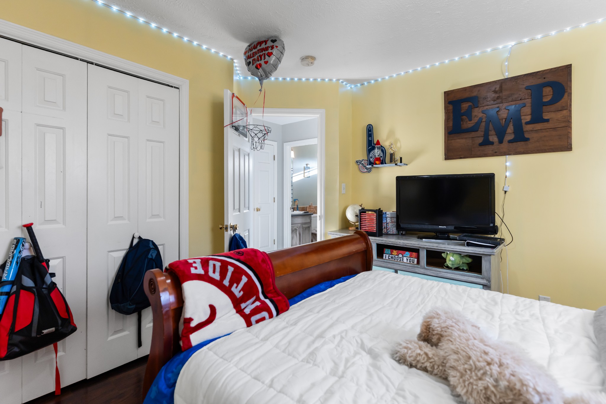 590 Jackson Hollow Road Goodspring, TN 38460 - Photo 34 of 37 a bedroom with a bed and a flat screen tv