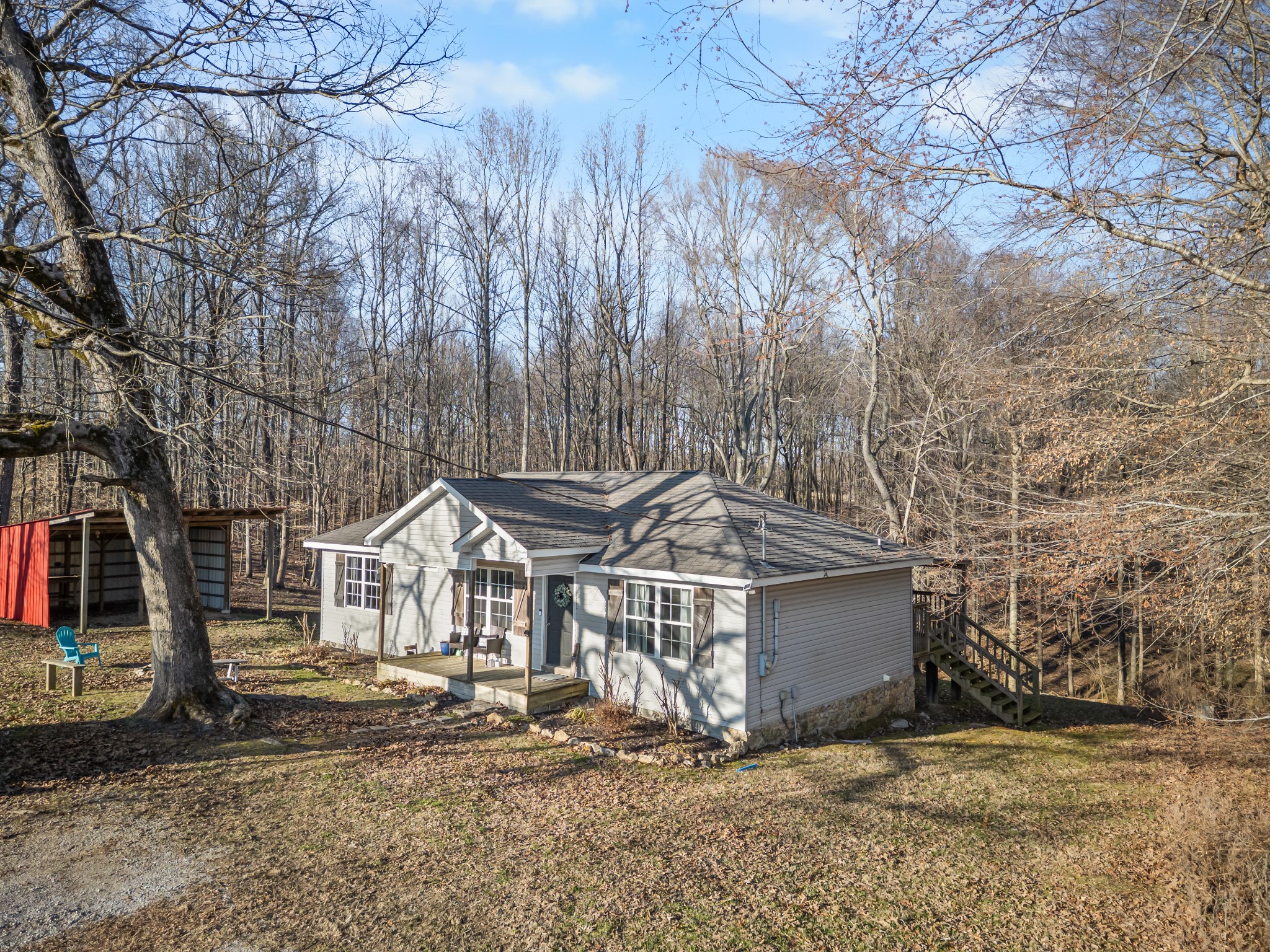590 Jackson Hollow Road Goodspring, TN 38460 - Photo 35 of 37 a view of a house with a yard