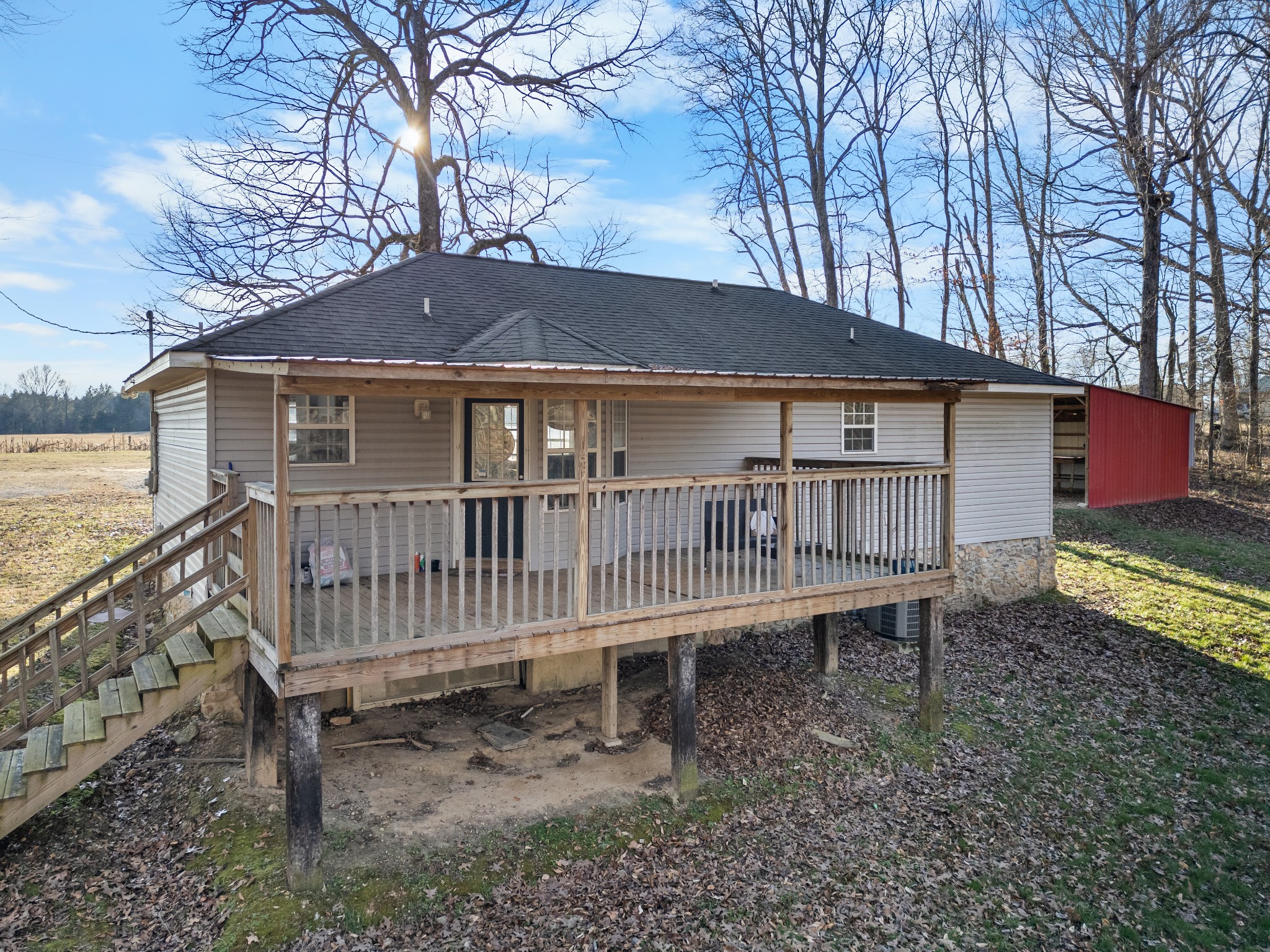 590 Jackson Hollow Road Goodspring, TN 38460 - Photo 37 of 37 a view of a house with a yard and wooden fence