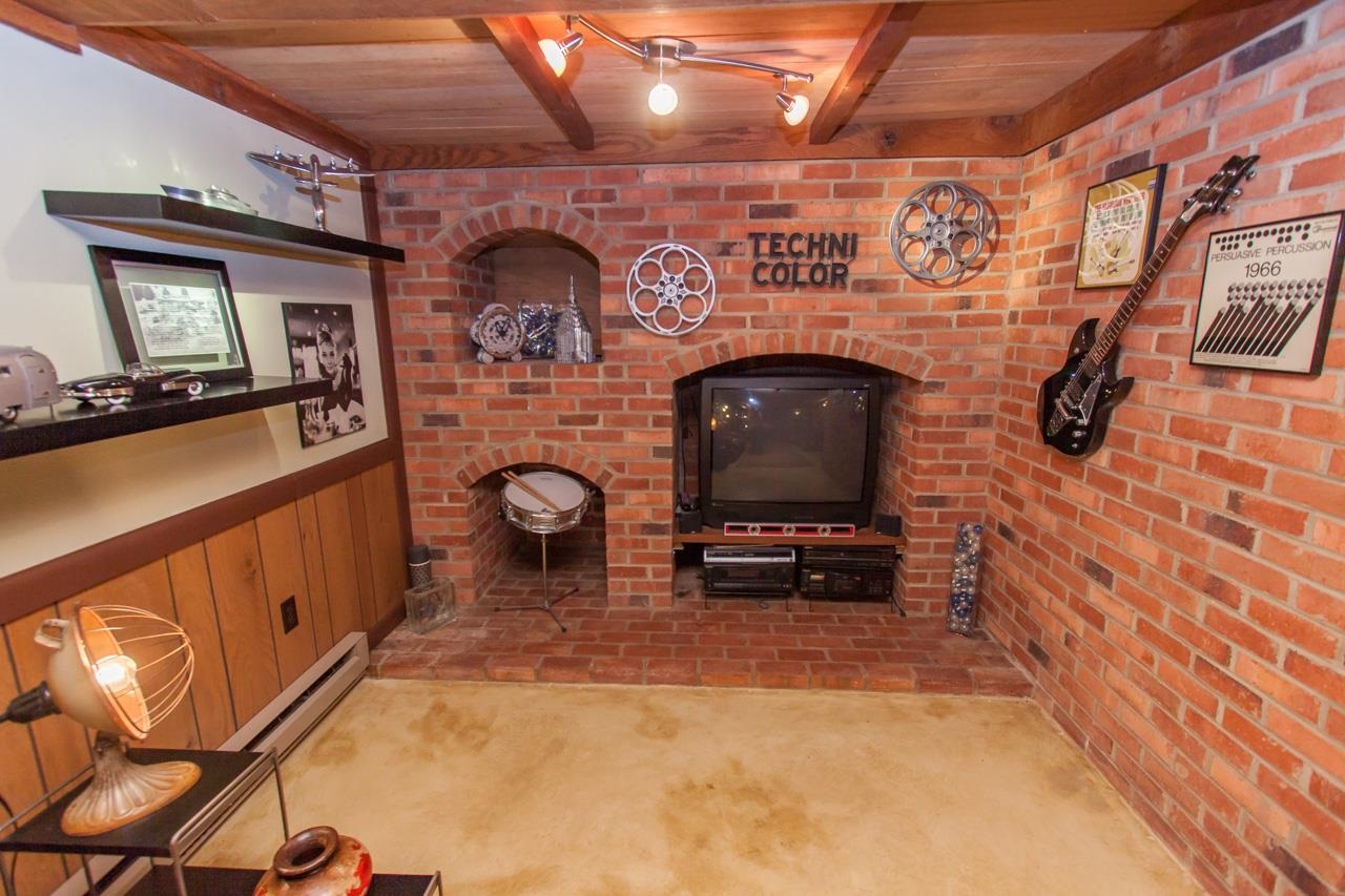 1278 Quick's Mill Road Staunton, VA 24401 - Photo 54 of 75 a living room with furniture a flat screen tv and a fireplace