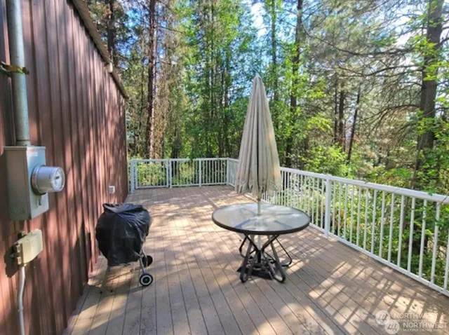 a view of backyard with a table and chair