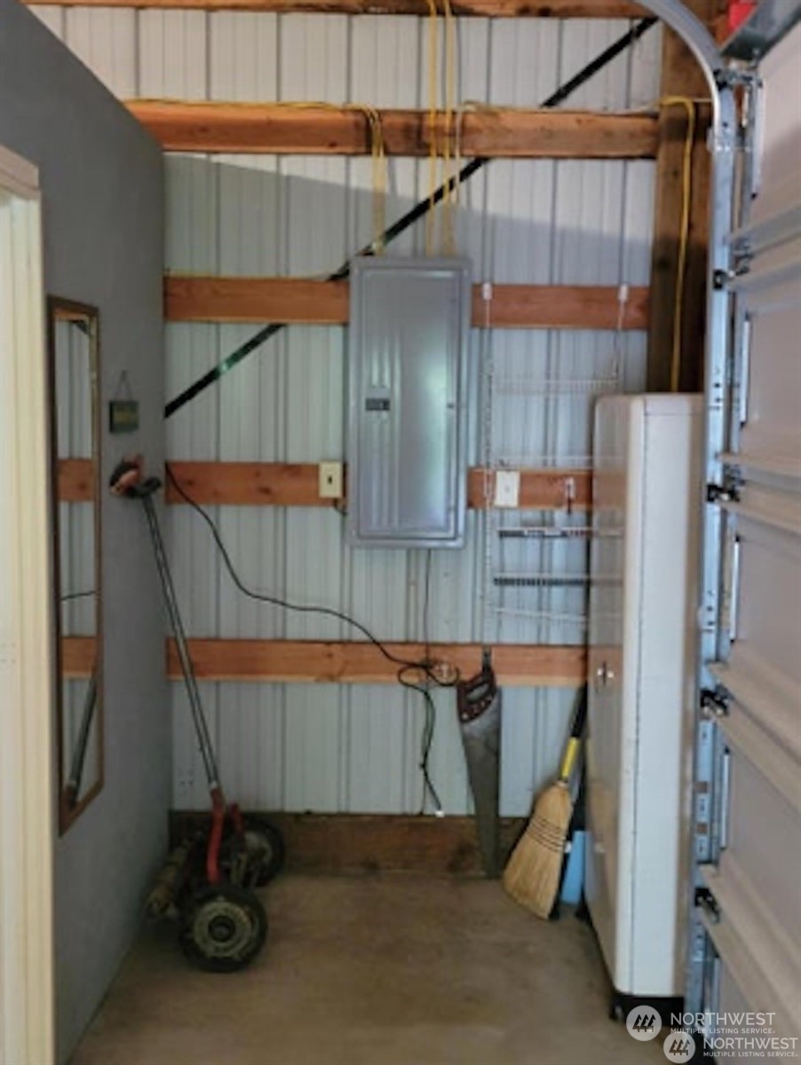 6 Twana Drive Inchelium, WA 99138 - Photo 15 of 18 a house that has a wooden floor and a small stove