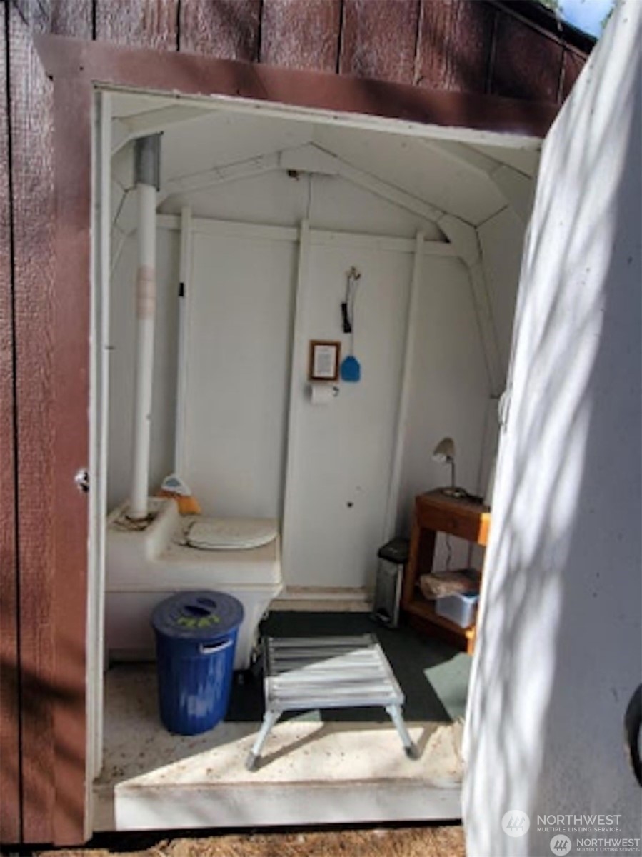 6 Twana Drive Inchelium, WA 99138 - Photo 17 of 18 a room with furniture and a potted plant