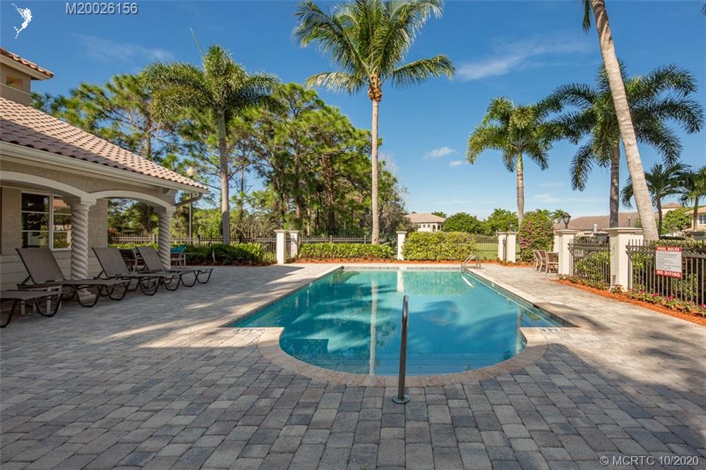 982 Southeast Willoughby Trace, Unit 15 Stuart, FL 34997 - Photo 31 of 36 a view of a backyard