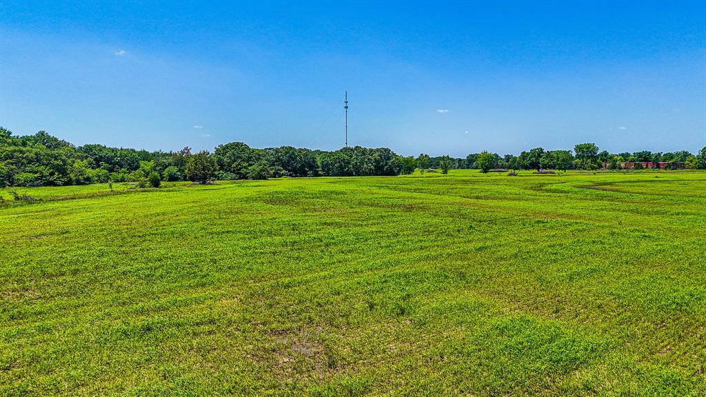 301 County Road Kerens, TX 75144 - Photo 11 of 39 a view of a field with an trees