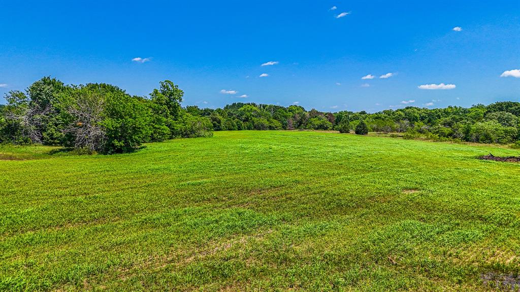 301 County Road Kerens, TX 75144 - Photo 18 of 39 a view of an ocean and a yard