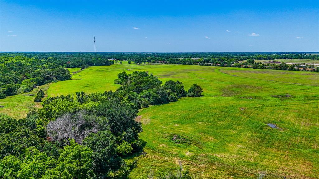 301 County Road Kerens, TX 75144 - Photo 34 of 39 a view of a golf course with a lake