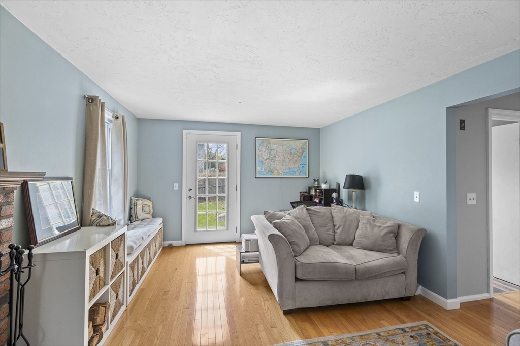 3 Marion Road Scituate, MA 02066 - Photo 14 of 30 a living room with furniture and a flat screen tv