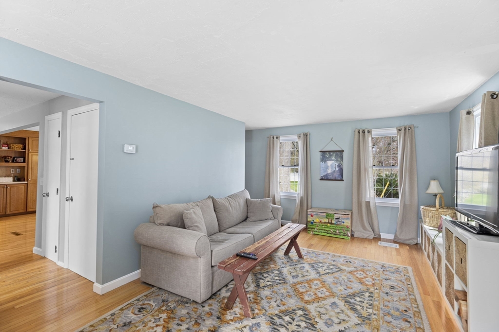 3 Marion Road Scituate, MA 02066 - Photo 15 of 30 a living room with furniture and a flat screen tv