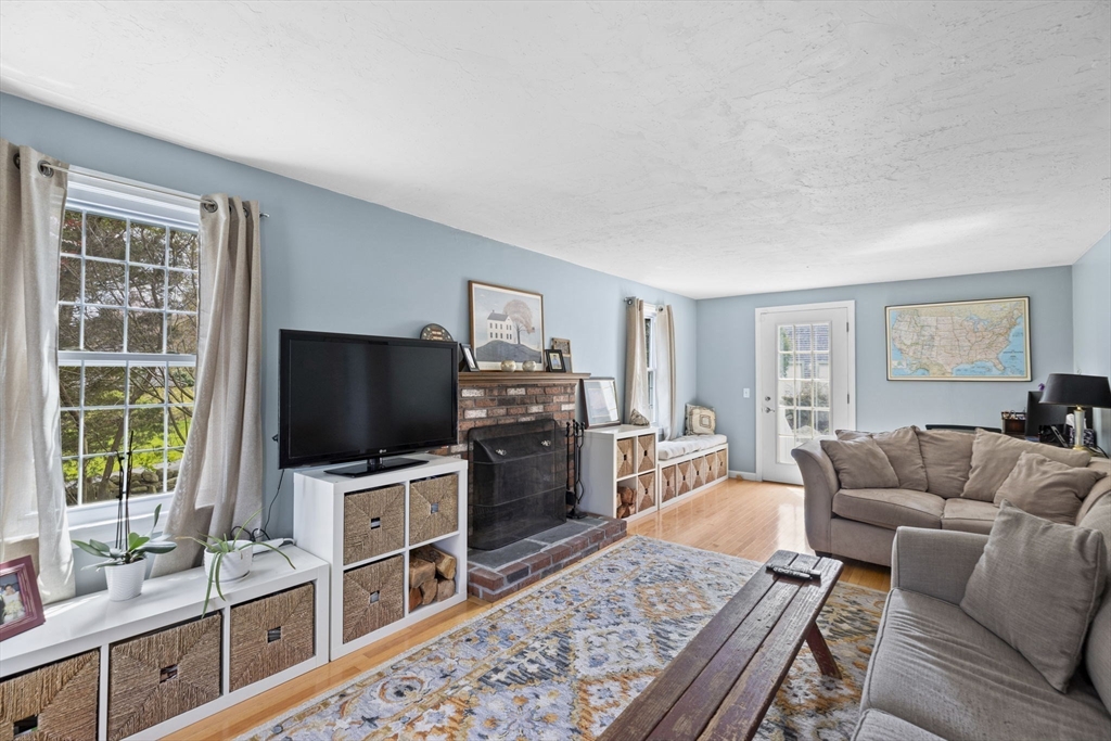 3 Marion Road Scituate, MA 02066 - Photo 17 of 30 a living room with furniture and a flat screen tv