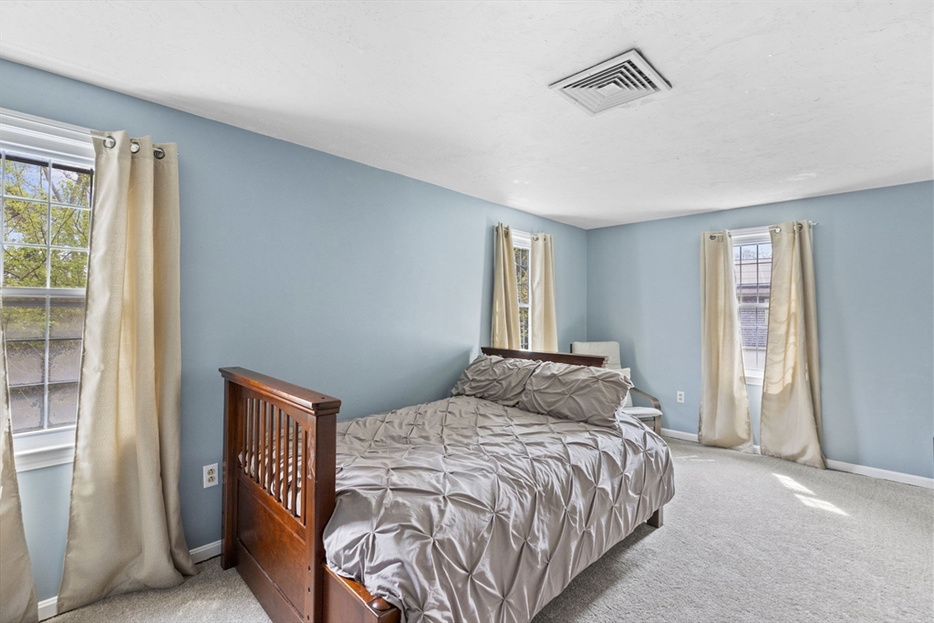 3 Marion Road Scituate, MA 02066 - Photo 18 of 30 a bedroom with a bed and window