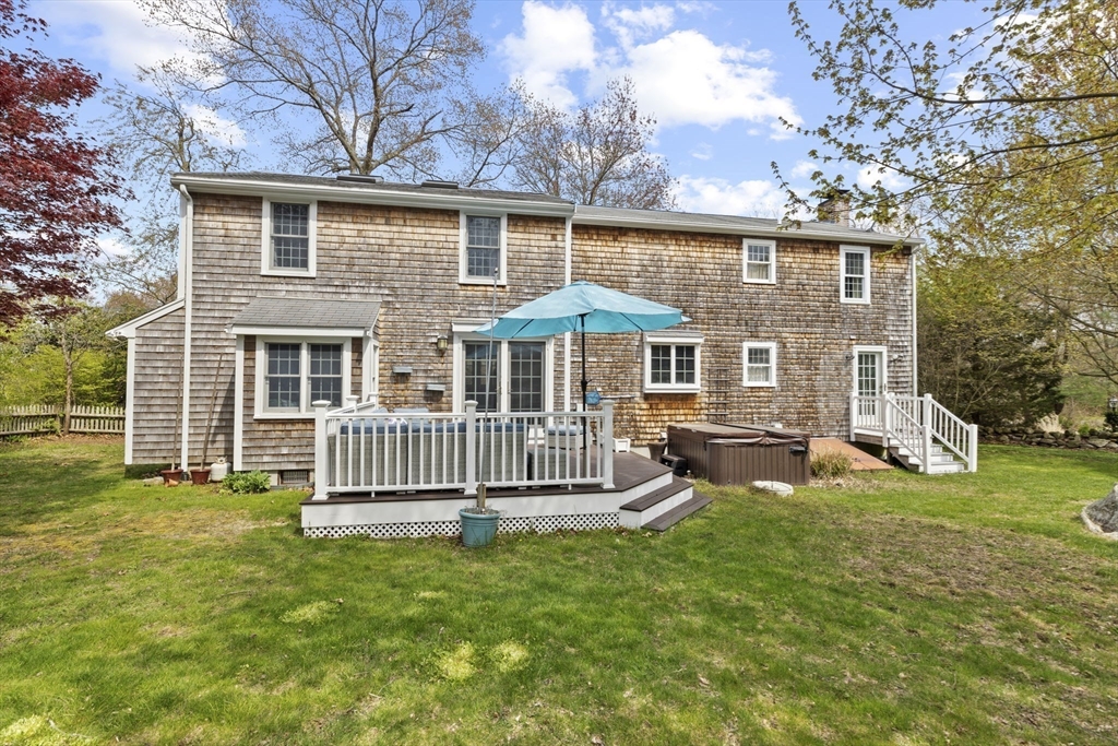 3 Marion Road Scituate, MA 02066 - Photo 27 of 30 a front view of a house with a garden