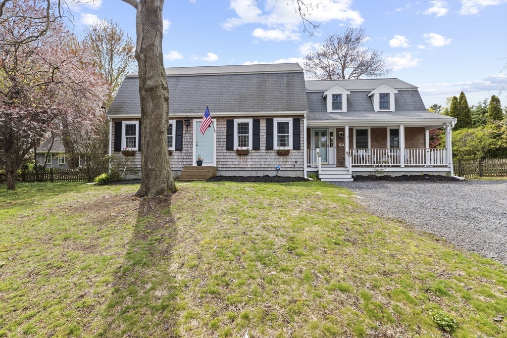 3 Marion Road Scituate, MA 02066 - Photo 28 of 30 a view of a house with a big yard and large tree
