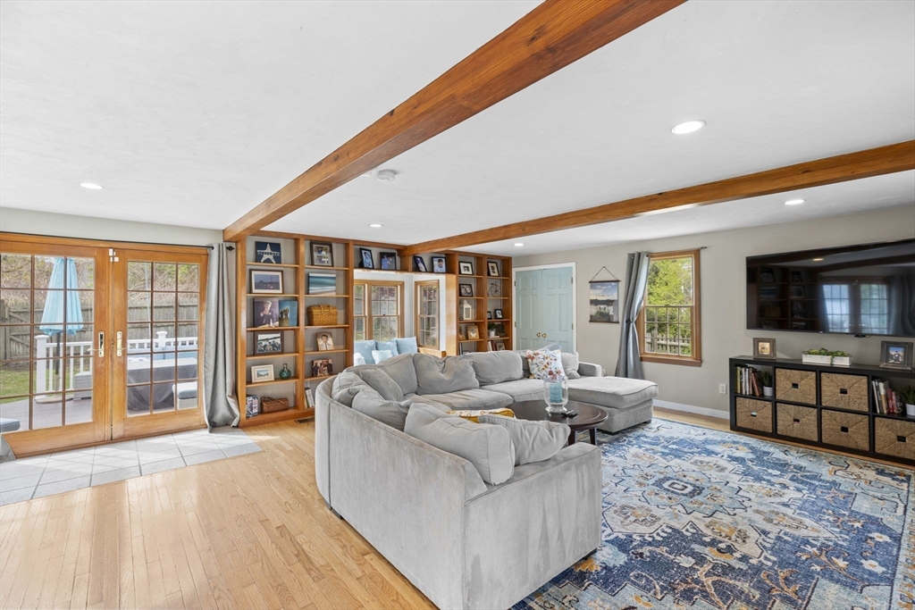 3 Marion Road Scituate, MA 02066 - Photo 5 of 30 a living room with furniture and a flat screen tv