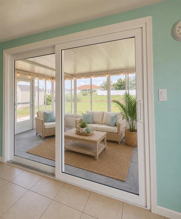 2755 Greendale Road North Port, FL 34287 - Photo 15 of 43 a living room with furniture and a large window