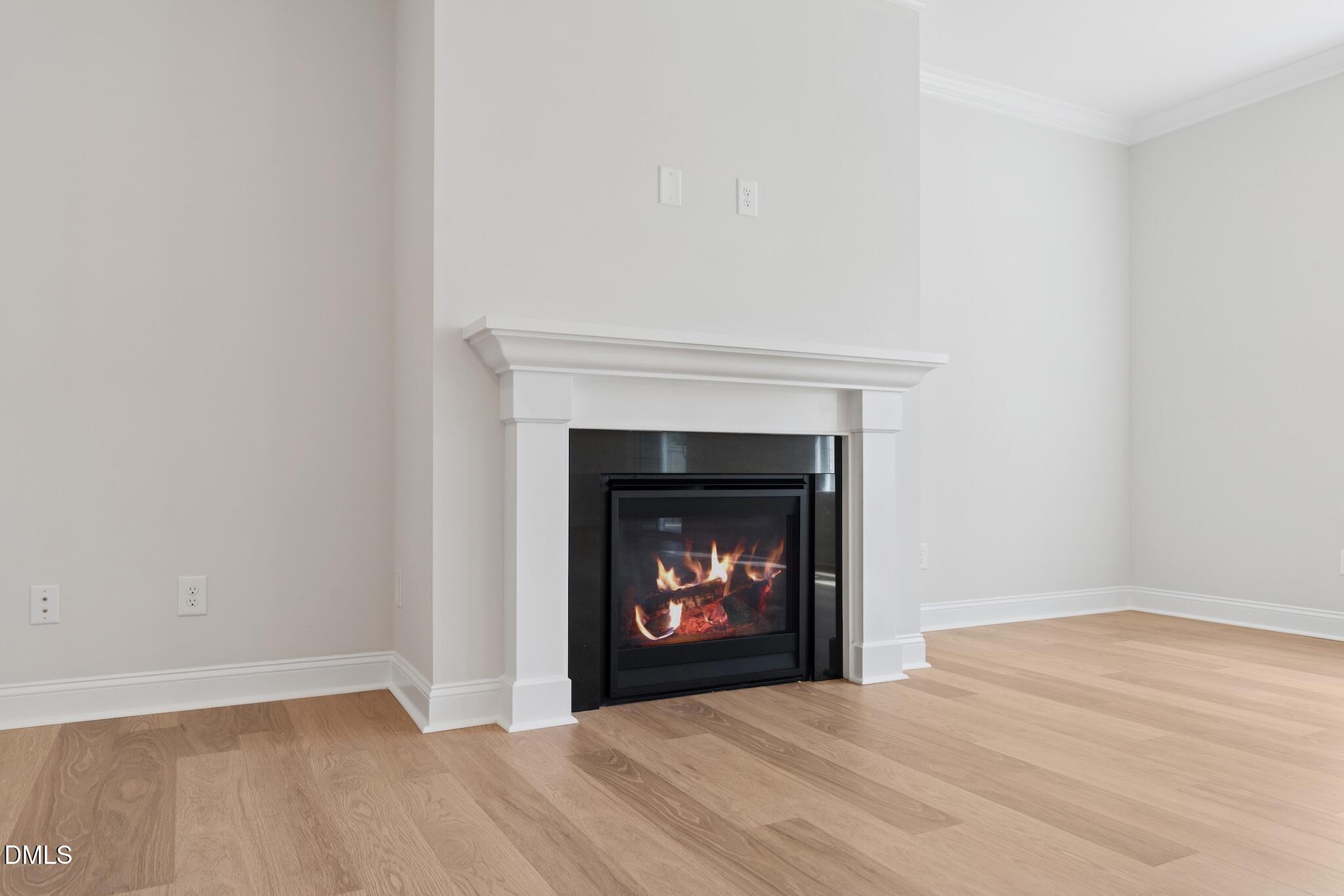 2616 Nordmann Fir Road Raleigh, NC 27616 - Photo 15 of 53 a room with a fireplace