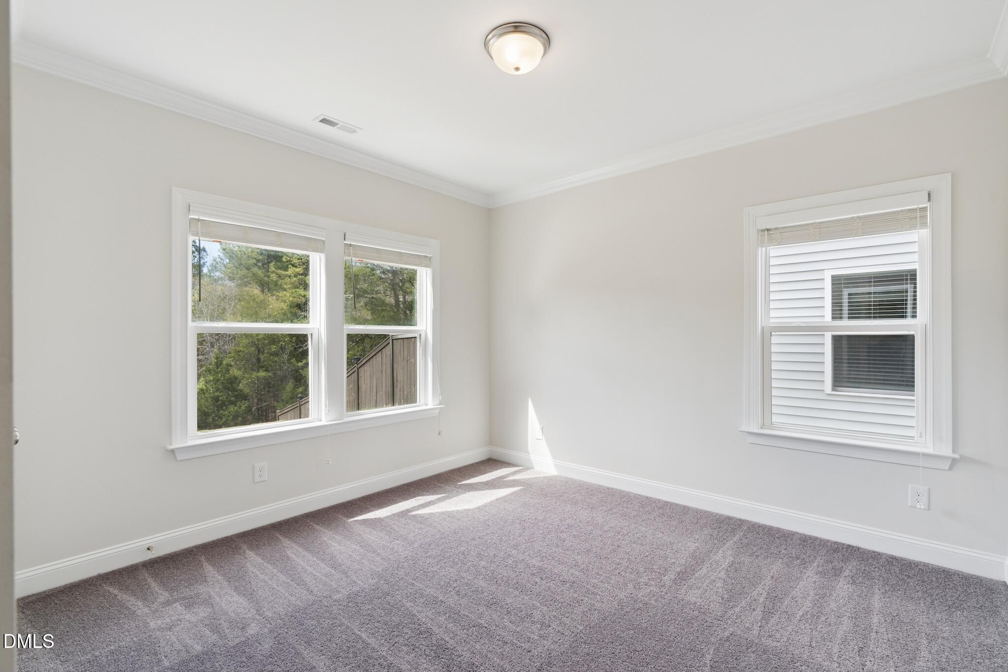 2616 Nordmann Fir Road Raleigh, NC 27616 - Photo 24 of 53 an empty room with a window