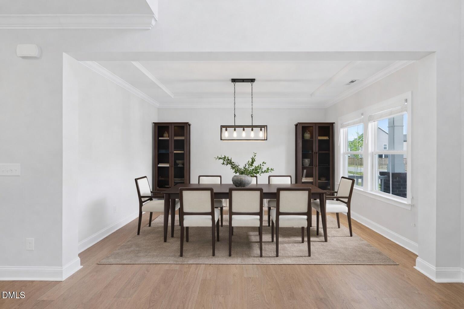 2616 Nordmann Fir Road Raleigh, NC 27616 - Photo 3 of 53 a dining room with furniture window and wooden floor
