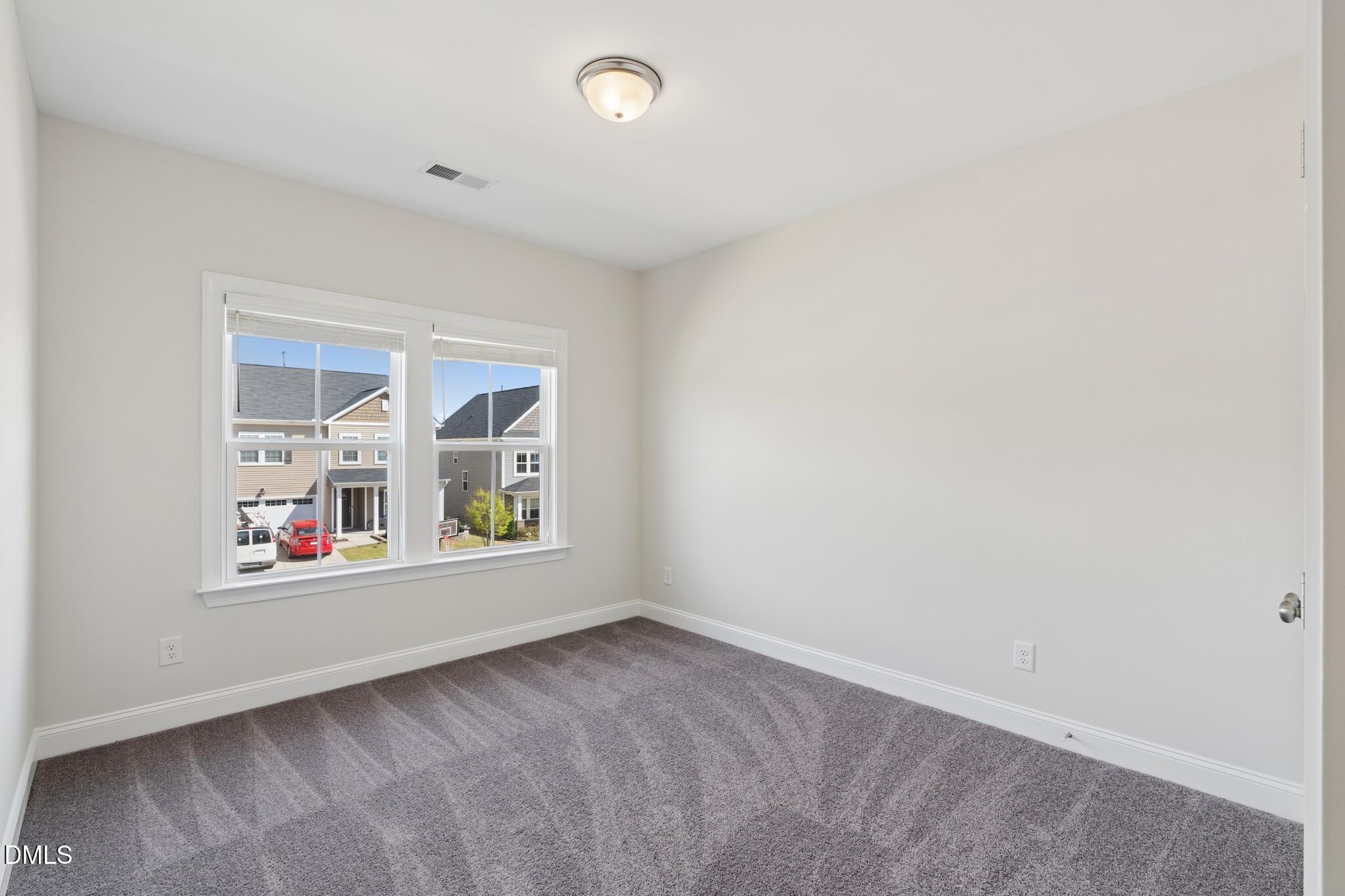 2616 Nordmann Fir Road Raleigh, NC 27616 - Photo 40 of 53 an empty room with window