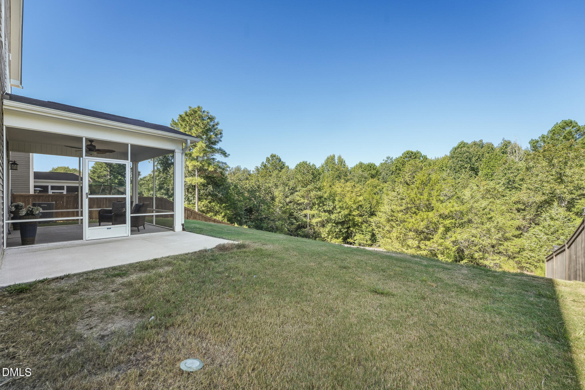 2616 Nordmann Fir Road Raleigh, NC 27616 - Photo 44 of 53 a view of a house with a backyard
